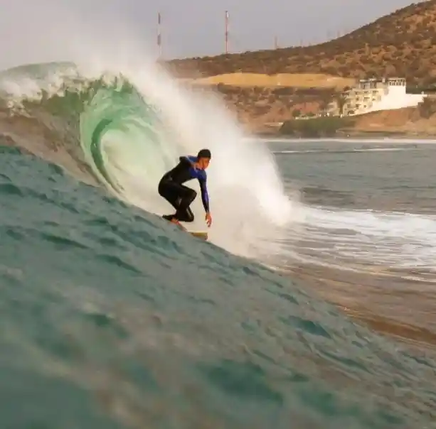 Surfing in Taghazout on Morocco Atlantic coast